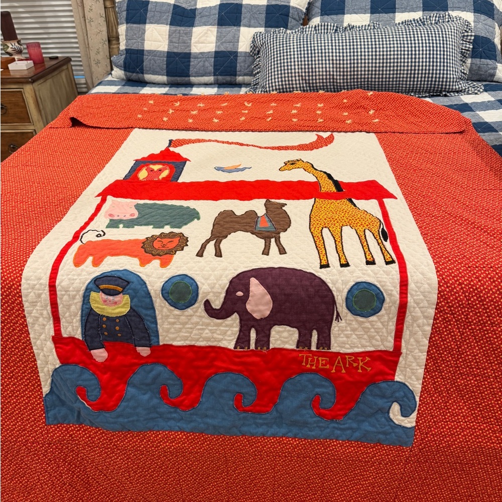 Vibrant Animal-Themed Quilt with Red and Blue Accents